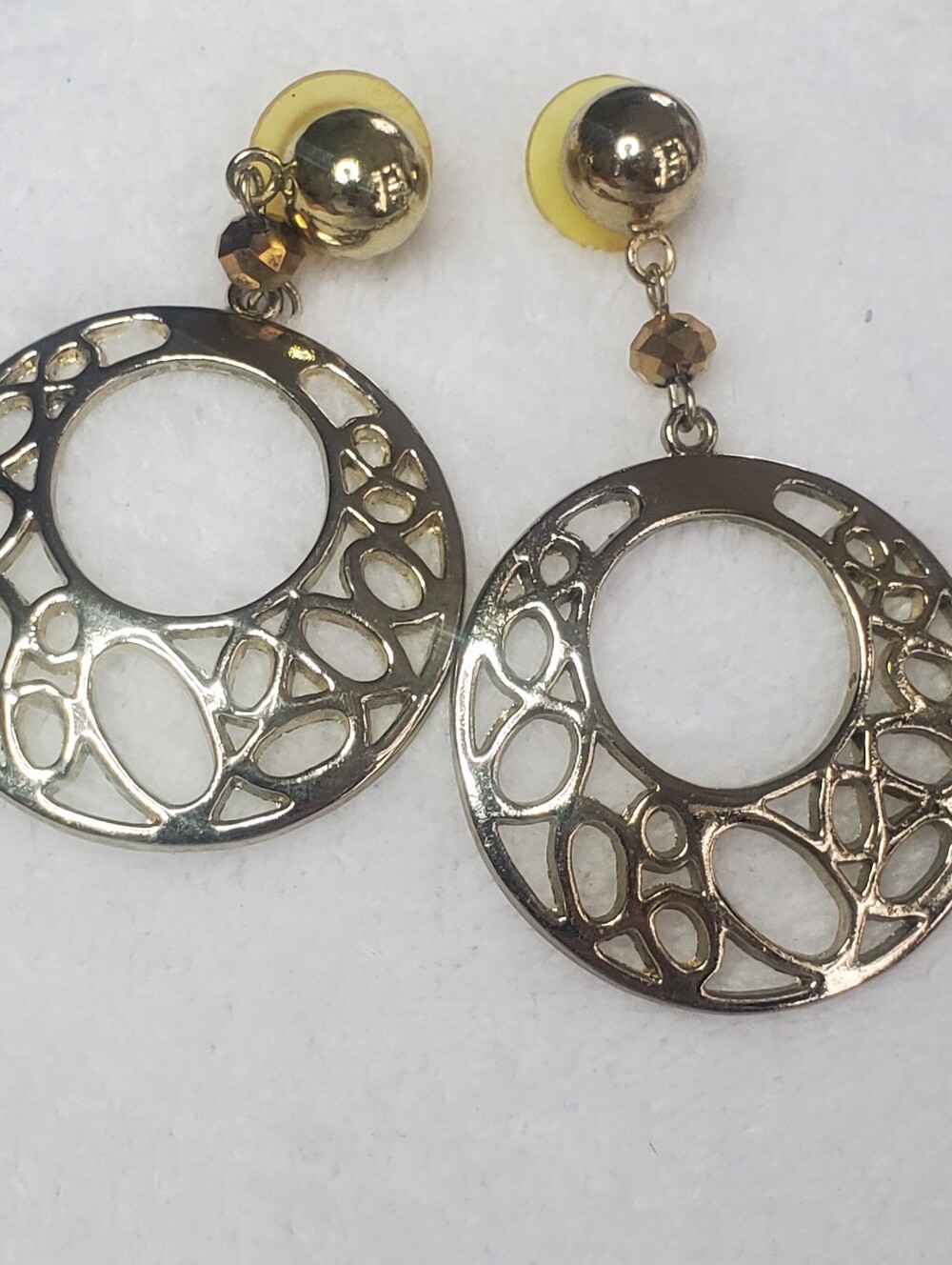 Gold-tone openwork dangle earring